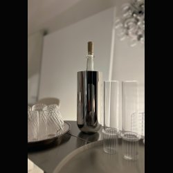  VASE . 24 CM H . POLISHED STEEL . ART DECO