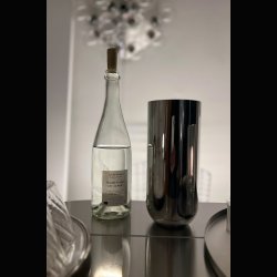  VASE . 24 CM H . POLISHED STEEL . ART DECO