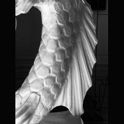 SCULPTURE . SEA DRAGON WITH BOY . 85 CM HIGH 