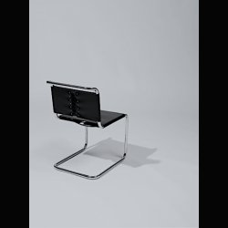 SPOLETO HAIRY LEATHER CHAIR . BY KNOLL